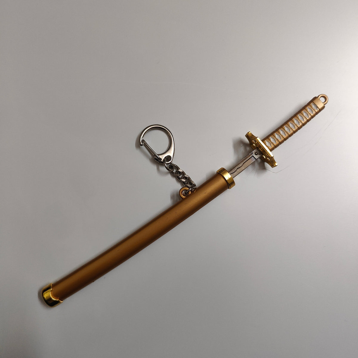 Roronoa Zoro Mini Katana Sword Keychain – Iconic Golden Blade | One Piece