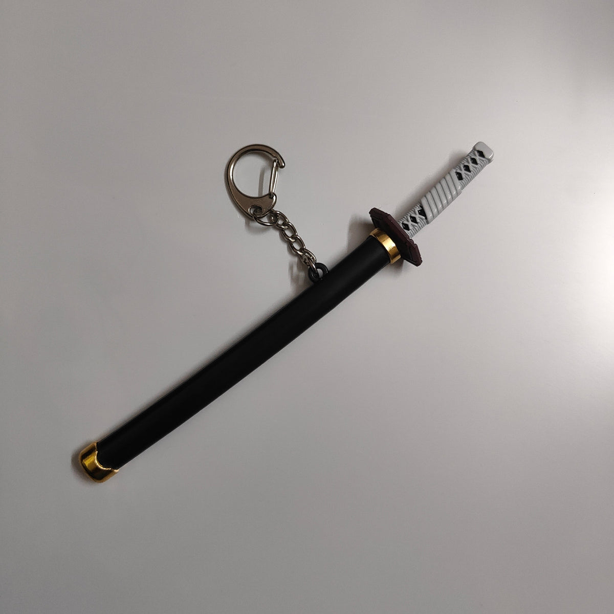 Giyu Tomioka Mini Katana Sword Keychain – Water Hashira Nichirin Blade | Demon Slayer