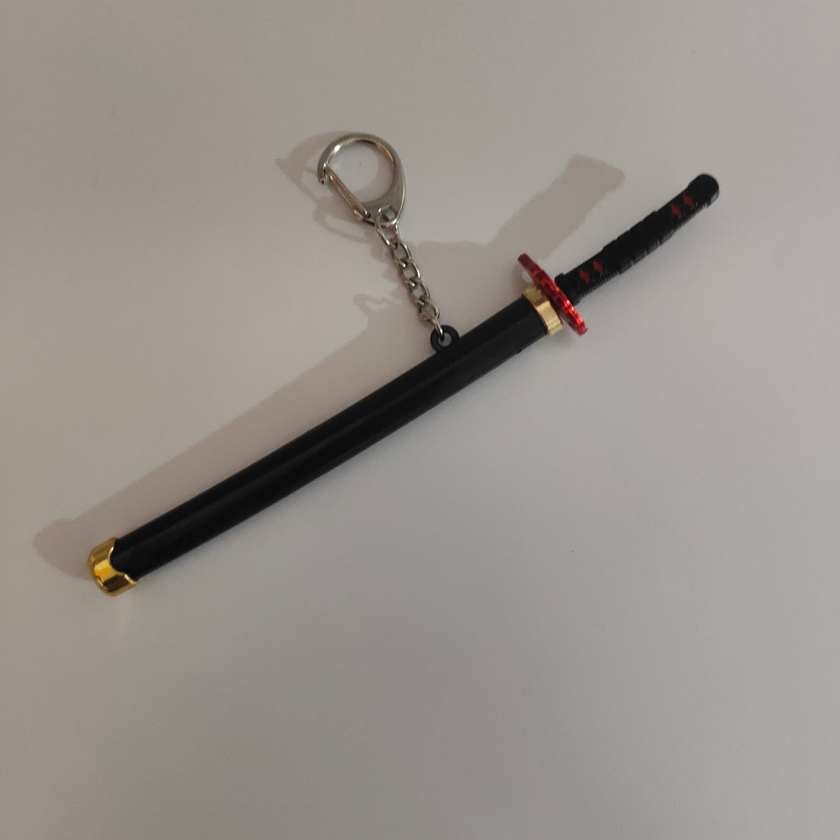 Tanjiro Kamado Mini Katana Sword Keychain – Nichirin Blade with Flame Guard | Demon Slayer