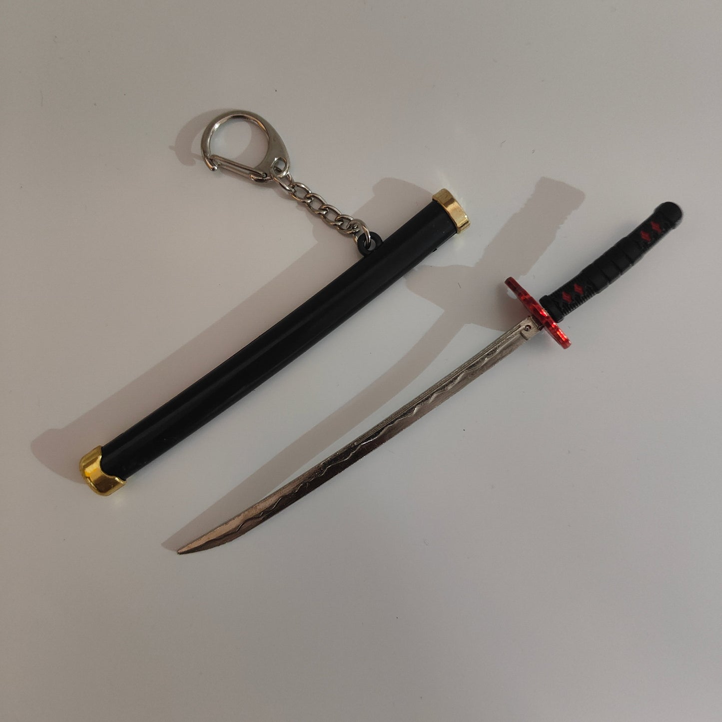 Tanjiro Kamado Mini Katana Sword Keychain – Nichirin Blade with Flame Guard | Demon Slayer