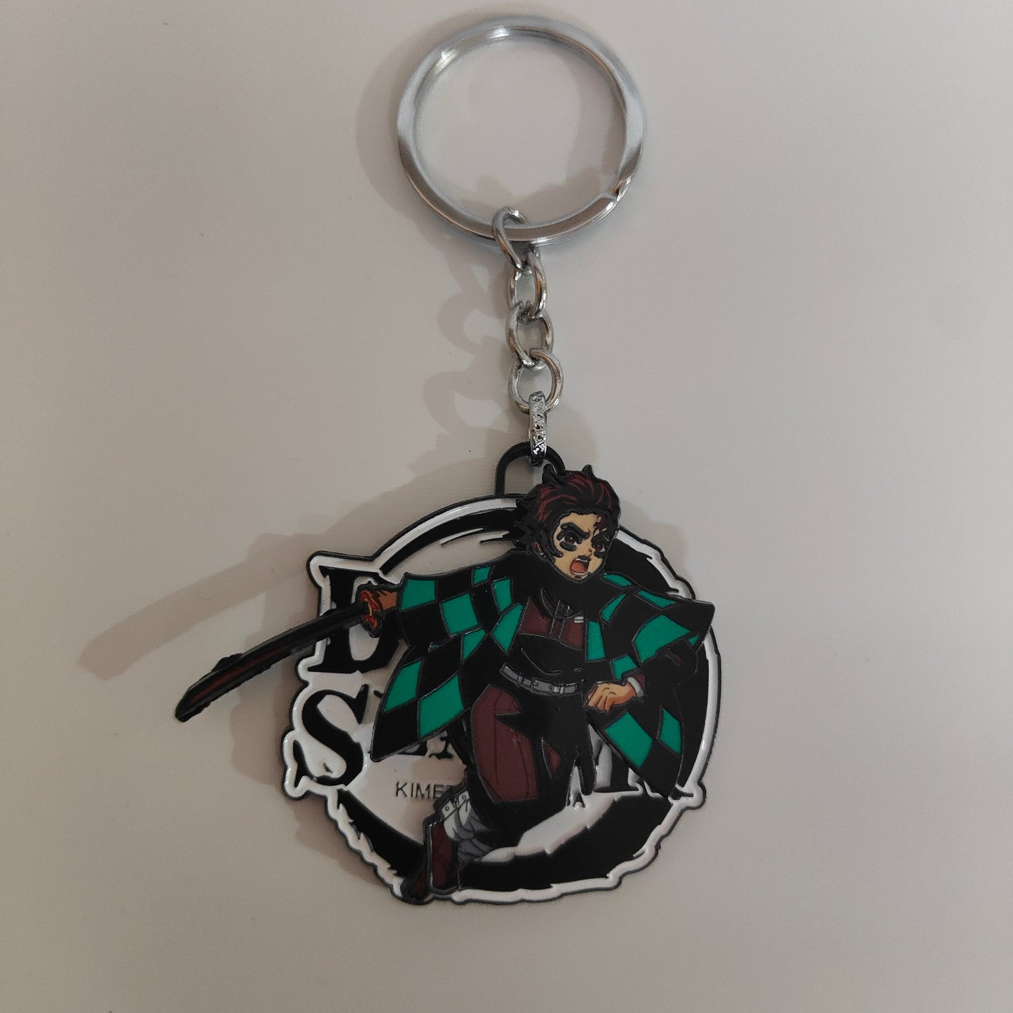 Tanjiro Kamado Spinning Metal Keychain – Fierce Tackle Stance | Demon Slayer