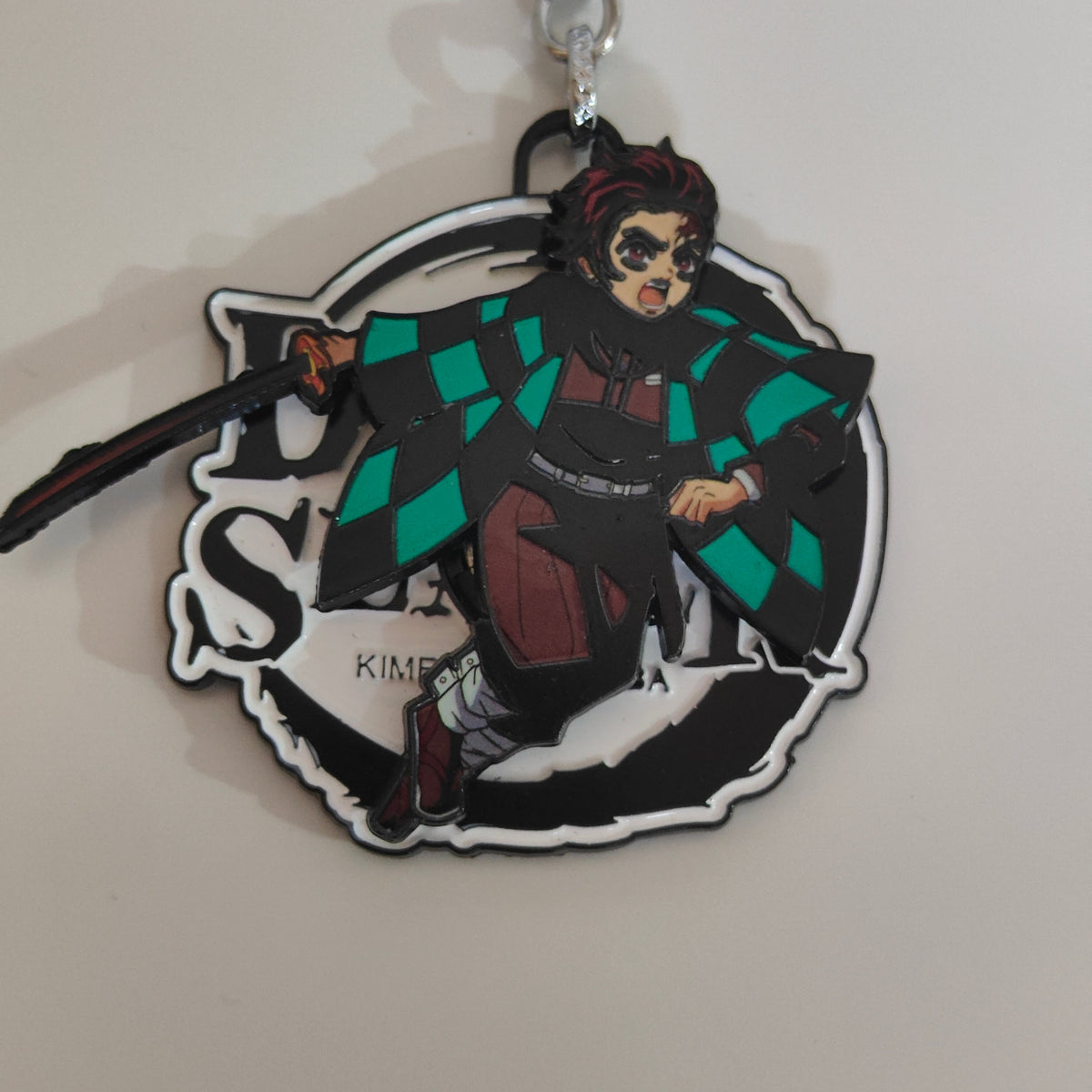 Tanjiro Kamado Spinning Metal Keychain – Fierce Tackle Stance | Demon Slayer