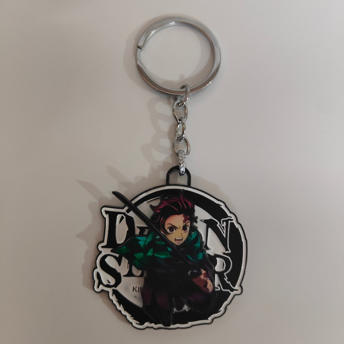 Tanjiro Kamado Spinning Metal Keychain – Iconic Attack Stance | Demon Slayer