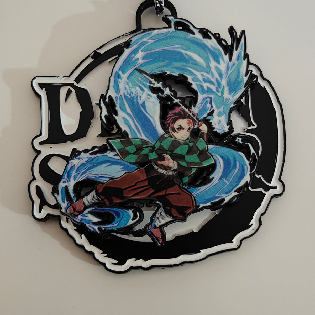 Tanjiro Kamado Spinning Metal Keychain – Water Breathing Dragon Form | Demon Slayer