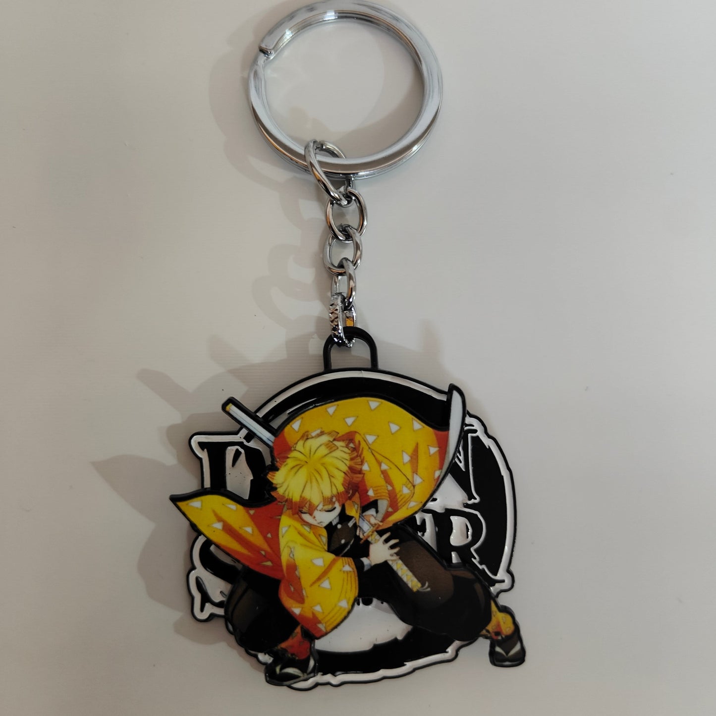 Zenitsu Agatsuma Spinning Metal Keychain – Sleeping Warrior Pose | Demon Slayer